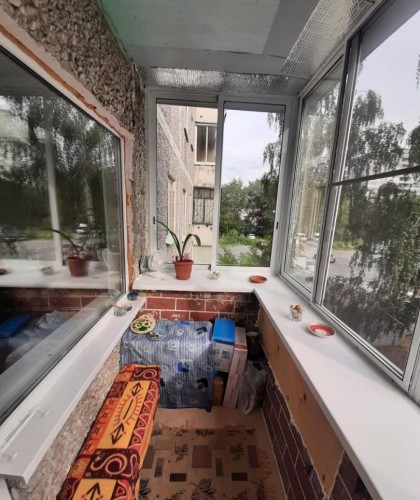 Холодное остекление балкона с выносом