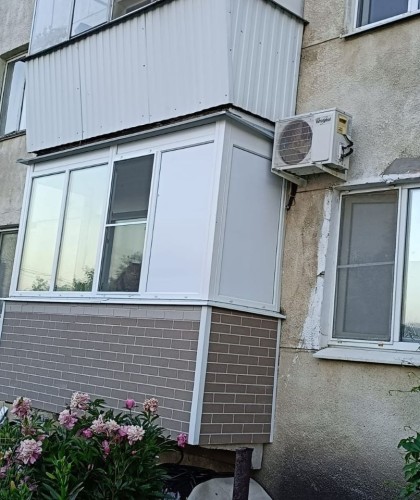 Остекление балкона с наружной отделкой