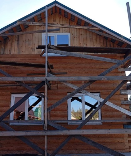 Монтаж окон в доме из бруса