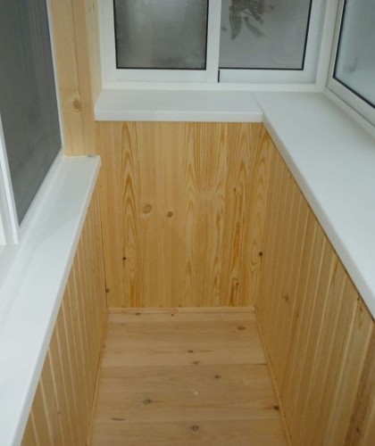 Остекление двух балконов с отделкой и обшивкой