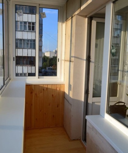 Остекление двух балконов с отделкой и обшивкой