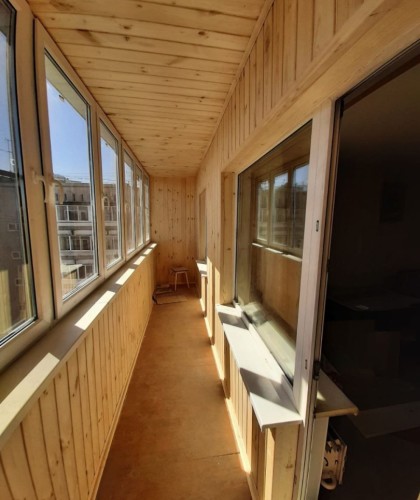 Теплая лоджия из профиля Veka, обшивка вагонкой класса А