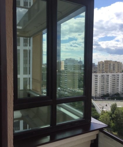 Остекление Г-образного балкона с ламинацией профиля