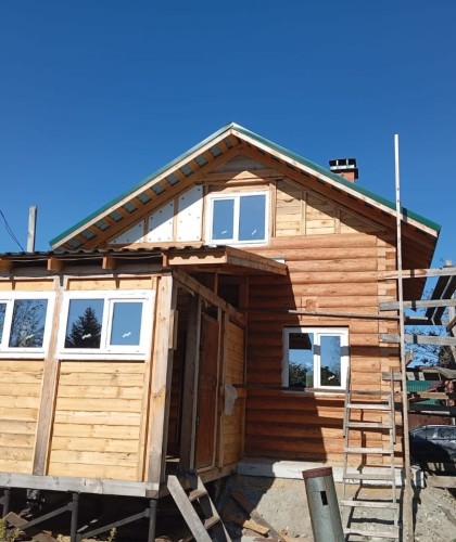 Монтаж окон в доме из бруса