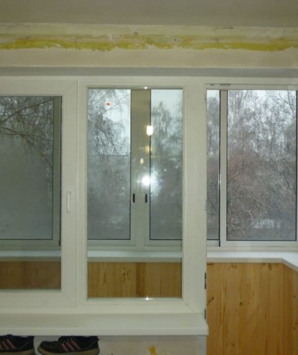 Остекление двух балконов с отделкой и обшивкой