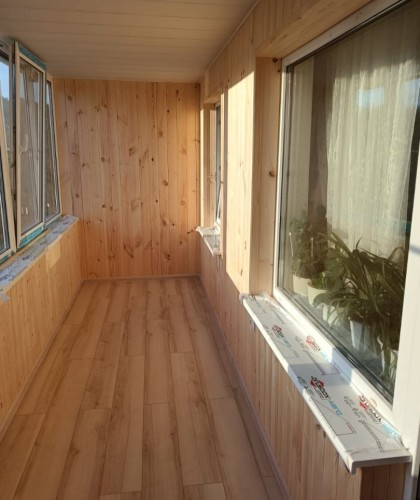 Остекление лоджии с обшивкой и установкой розеток