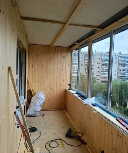 Остекление лоджии с обшивкой и установкой розеток