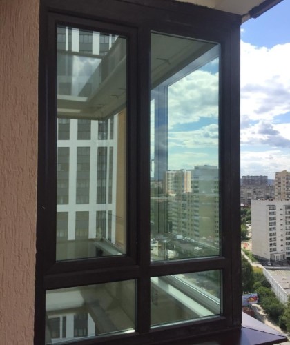 Остекление Г-образного балкона с ламинацией профиля