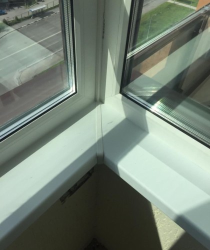 Остекление Г-образного балкона с ламинацией профиля